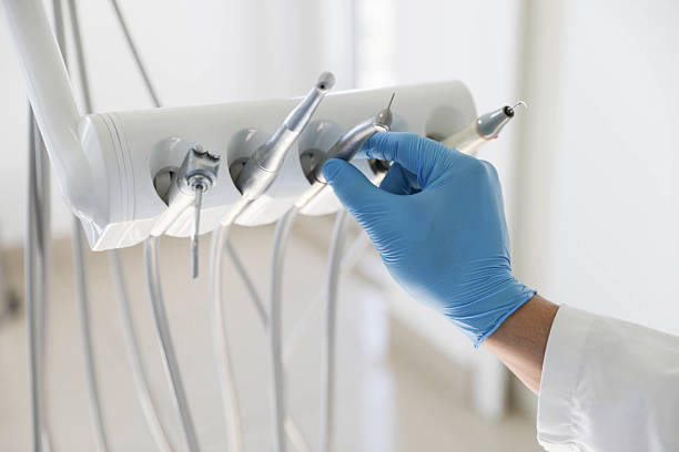 Professional Tooth Extraction technician working in Midlothian, VA